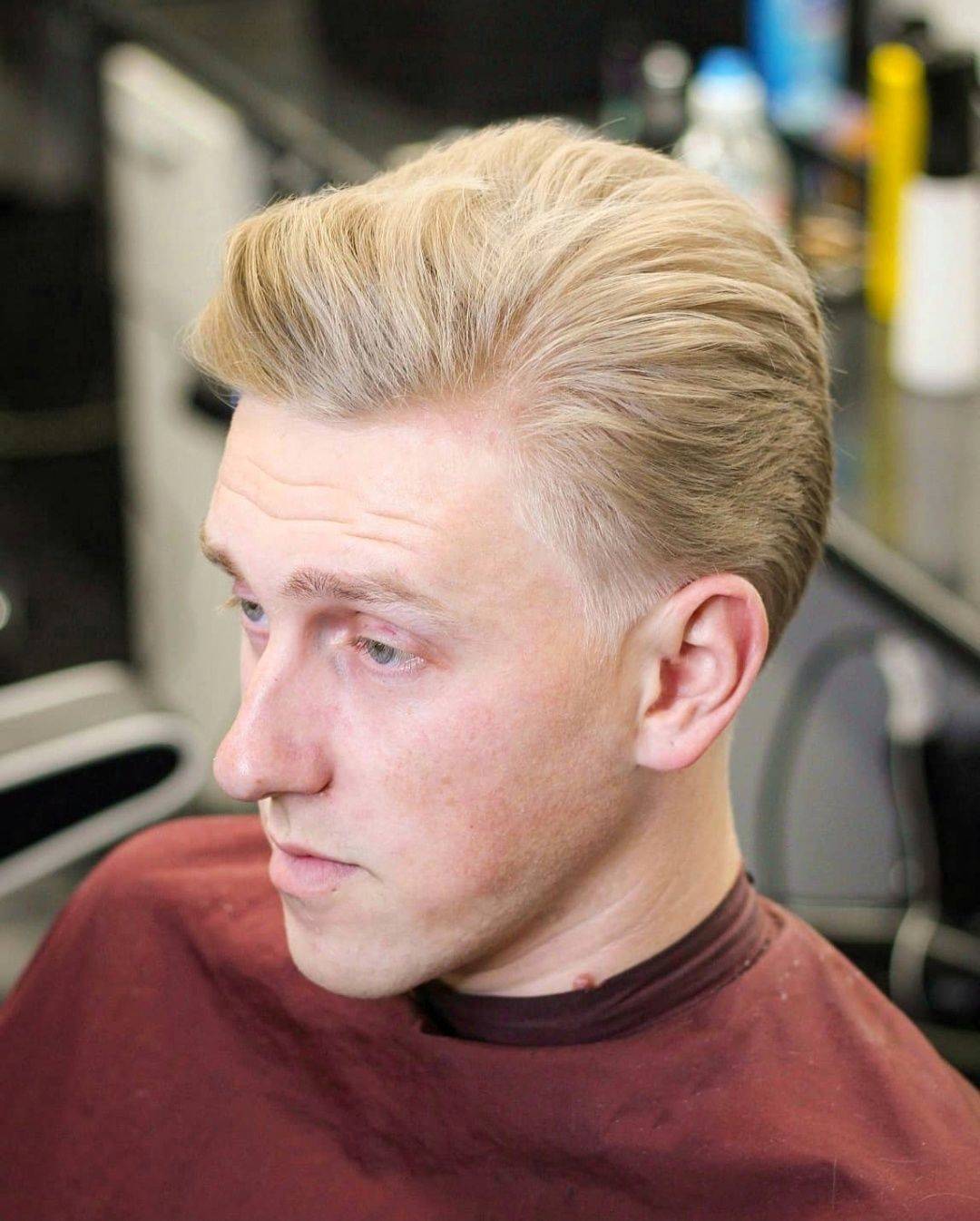 Blond swept-back cut