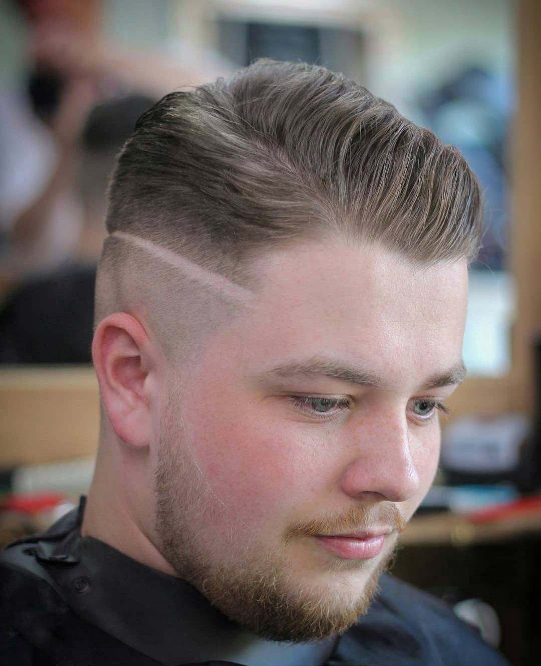 Skin fade with a hard part line